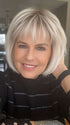Donna @style.me.ageless wearing SING by ELLEN WILLE in color PLATINUM BLONDE ROOTED 61.101.1001 | Pure White, Pearl Platinum, and Winter White with Shaded Roots