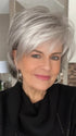 Donna @style.me.ageless wearing SKY by NORIKO in color SILVER STONE | Silver Medium Brown blend that transitions to more Silver then Medium Brown then to Silver Bangs